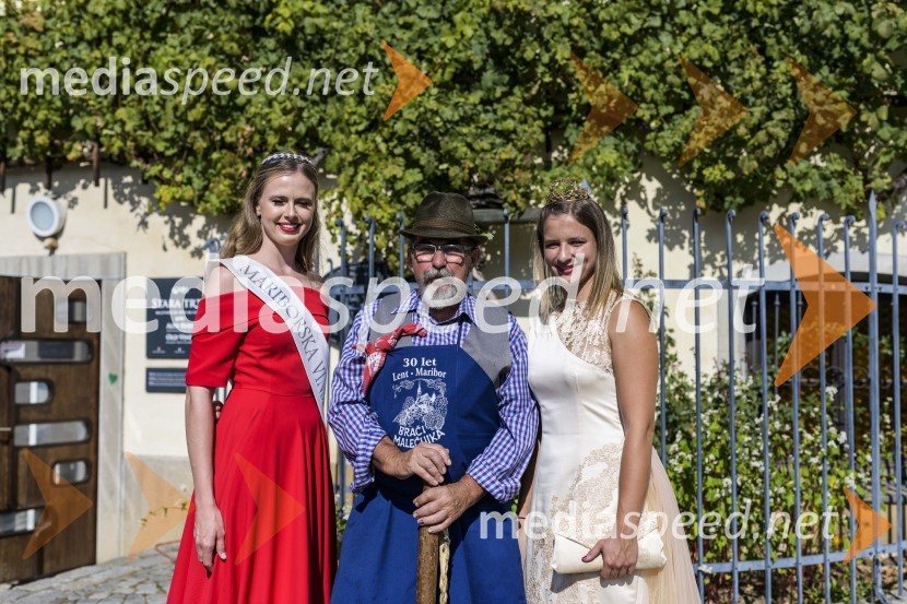 Neža Jarc, Mariborska vinska kraljica 2020;  Alojz  Jenuš - Slavek, outar in brač iz Malečnika;  Ana Pavlin, 24. vinska kraljica Slovenije35. Svečana trgatev Stare trte