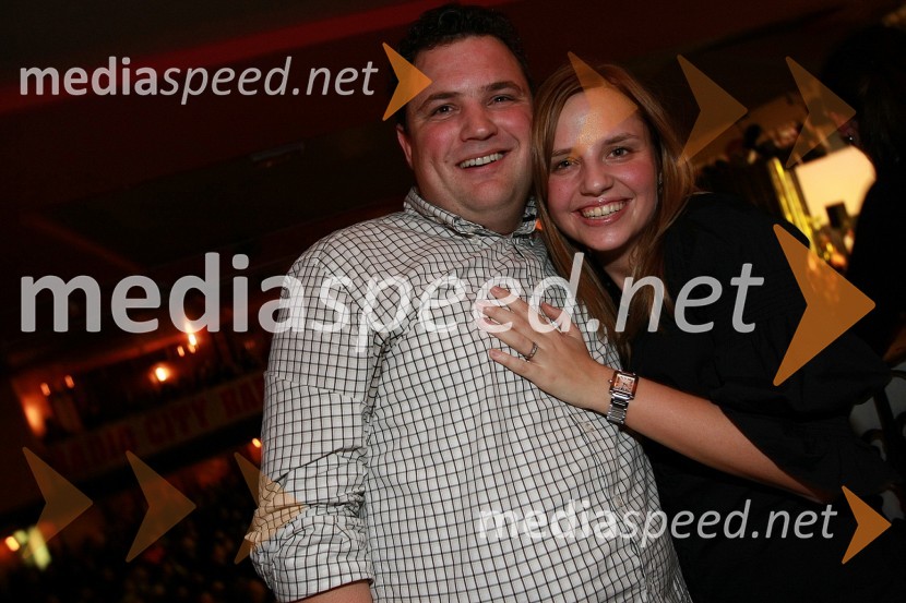 Damijan Koletnik, direktor Dravskih elektrarn Maribor in predsednik Nadzornega sveta Telekoma Slovenije in žena SandraMagnifico, božični koncert