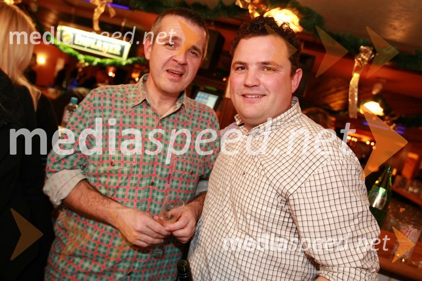 Uroš Skuhala, direktor časnika Večer in Damijan Koletnik, direktor Dravskih elektrarn Maribor in predsednik Nadzornega sveta Telekoma SlovenijeMagnifico, božični koncert