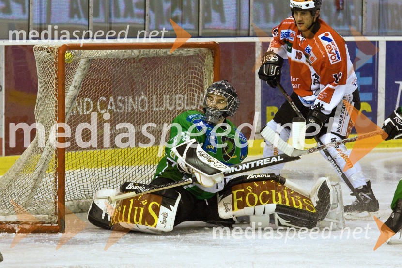 Markus Korhonen, vratar Tilie Olimpije in Rem Murray, hokejist InnsbruckaHokej: Liga Ebel, 42. krog: Tilia Olimpija - Innsbruck