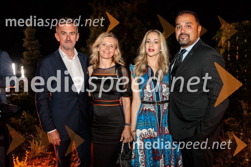  Marko Lukić, lastnik in direktor družbe Lumar IG;  Alenka Lukić;  Eva Yildirim ;  Ugur Yildirim , direktor ECP Tactical OpportunitiesKresna noč 2022, dobrodelna prireditev Lions kluba Ljubljana Ilirija