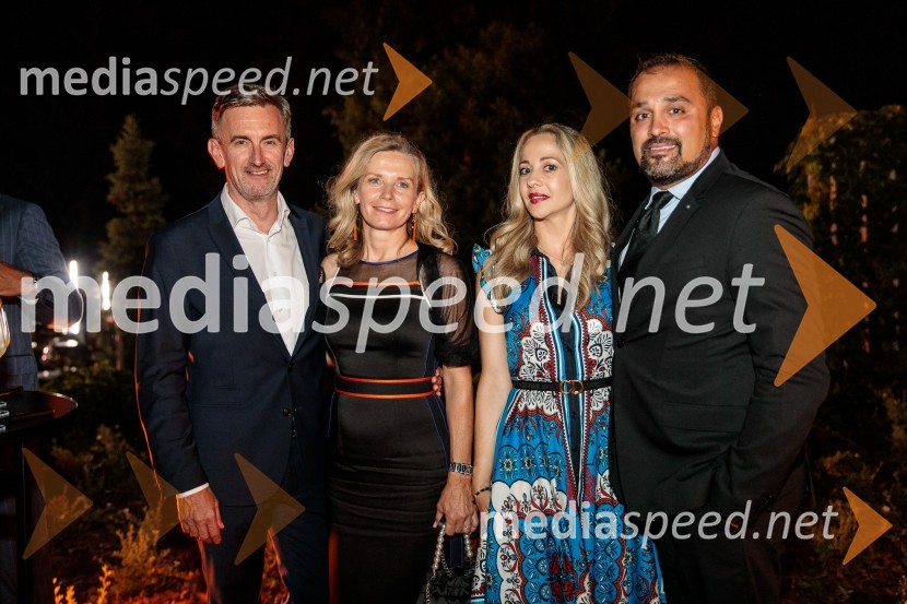  Marko Lukić, lastnik in direktor družbe Lumar IG;  Alenka Lukić;  Eva Yildirim ;  Ugur Yildirim , direktor ECP Tactical OpportunitiesKresna noč 2022, dobrodelna prireditev Lions kluba Ljubljana Ilirija