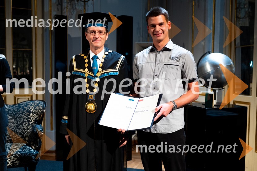 prof. dr. Zdravko Kačič, rektor Univerze v Mariboru;  Marko Gluhak, prejemnik listine za razvoj obštudijskih dejavnosti UM 2022Dan Univerze v Mariboru 2022