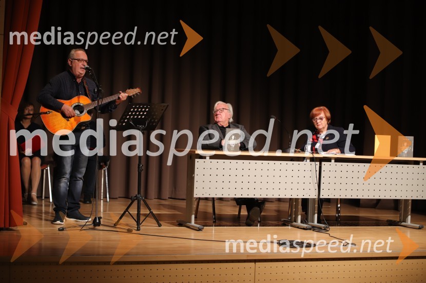  Rudi Kraner, pevec;  Tone Partljič, pisatelj;  Milena Pivec, direktorica Založbe PivecTone Partljič, predstavitev zbirke kratkih zgodb z naslovom Strnišča