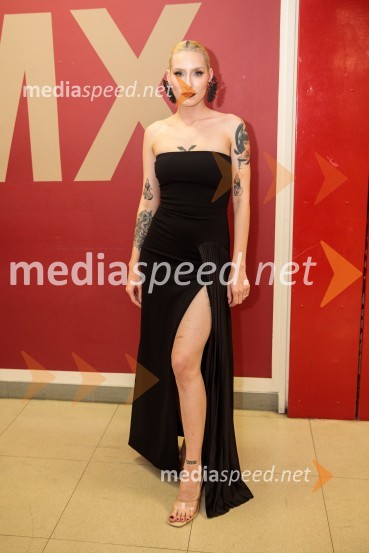  Sara Briški Cirman - Raiven, pevka, harfistkaSlovenska popevka 2022 je skladba Nove slike Mie Guček