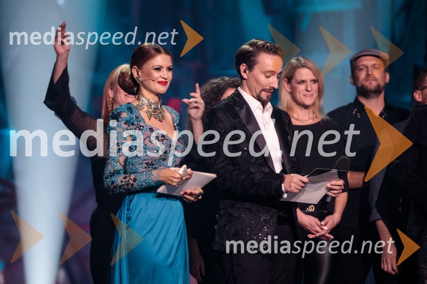  Nina Osenar Kontrec, pevka, voditeljica, model;  Jure Kopušar, igralecSlovenska popevka 2022 je skladba Nove slike Mie Guček