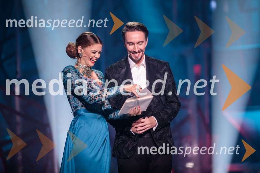  Nina Osenar Kontrec, pevka, voditeljica, model;  Jure Kopušar, igralecSlovenska popevka 2022 je skladba Nove slike Mie Guček