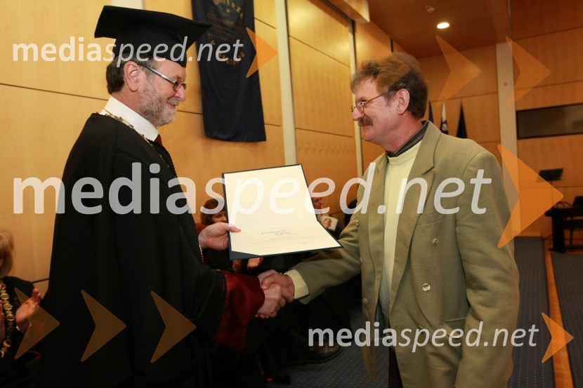 Prof. dr. Ivan Rozman, rektor Univerze v Mariboru in Marijan Jeromel, dobitnik Bronastega ključa UM za leto 2008Rektorjev dan Univerze v Mariboru 2009, promocija doktorjev znanosti in podelitev nagrad
