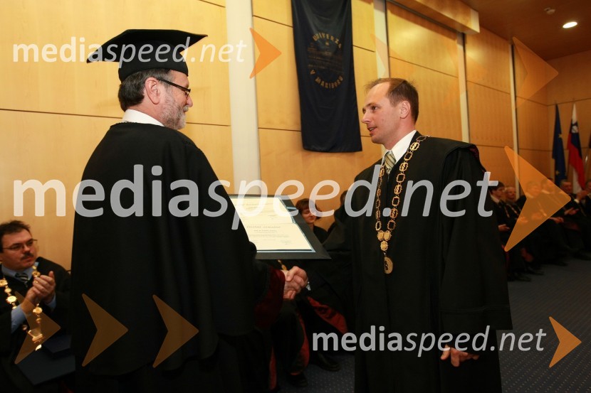 Prof. dr. Ivan Rozman, rektor Univerze v Mariboru in prof. dr. Rajko Knez, dekan Pravne fakultete UM (priznanje je prevzel v imenu Ludvika Toplaka, dobitnika naslova častnega senatorja Univerze v Mariboru)Rektorjev dan Univerze v Mariboru 2009, promocija doktorjev znanosti in podelitev nagrad