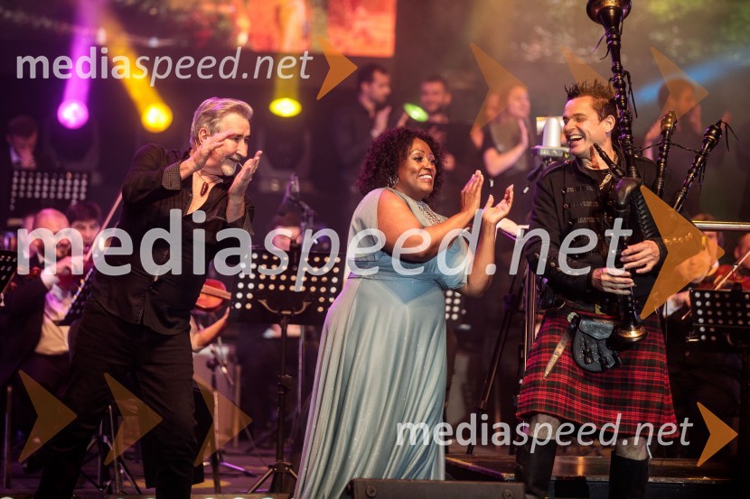  William  Kircher, igralec, povezovalec;  Solani Manyike, pevka;  Wim Dobbrisch, The KingsPipersKoncert filmske glasbe Gospodarja prstanov in Hobita, 71. Ljubljana Festival