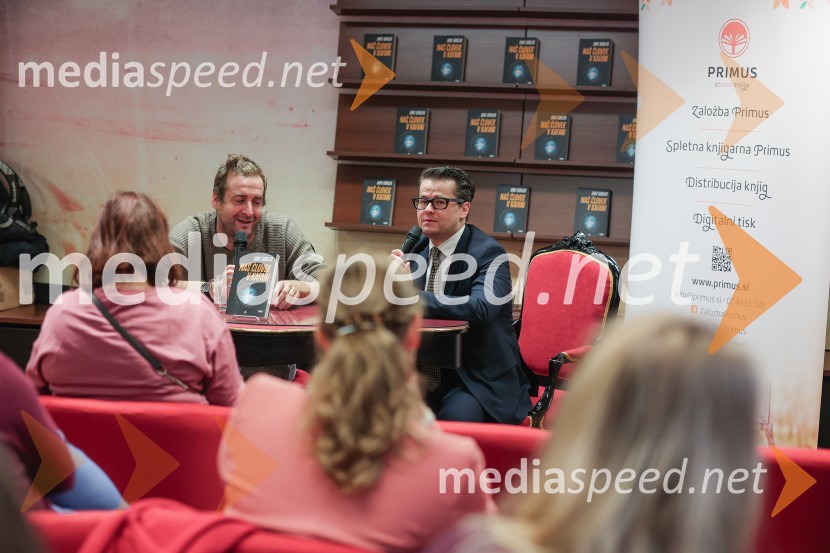  Anže Tomič;  Jure Godler, televizijski voditeljDruženje z Juretom Godlerjem ob izidu romana Naš človek v kafani