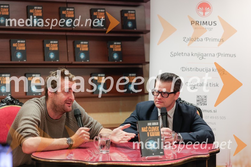  Anže Tomič;  Jure Godler, televizijski voditeljDruženje z Juretom Godlerjem ob izidu romana Naš človek v kafani