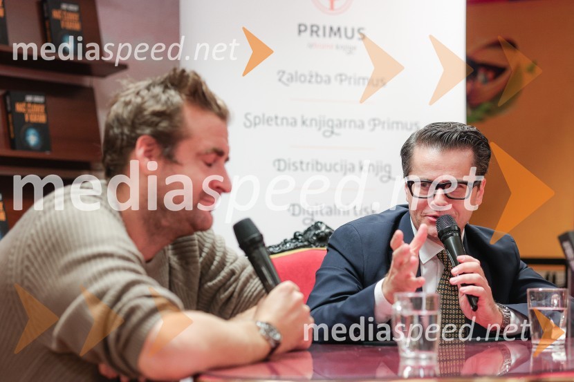  Anže Tomič;  Jure Godler, televizijski voditeljDruženje z Juretom Godlerjem ob izidu romana Naš človek v kafani