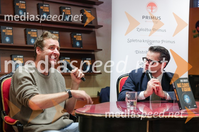  Anže Tomič;  Jure Godler, televizijski voditeljDruženje z Juretom Godlerjem ob izidu romana Naš človek v kafani