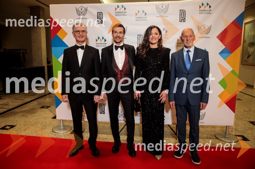  Franjo Bobinac, podpredsednik in generalni direktor za globalni marketing, Hisense International., predsednik Rokometne zveze Slovenije;  Primož Roglič, kolesar;  Lora Roglič Klinc;  Miroslav Cerar, nekdanji gimnastičar, nekdanji predsednik Odbora za podeljevanje Bloudkovih priznanjPrimož Roglič predal naziv botra, dobrodelna prireditev Olimpijskega komiteja Slovenije