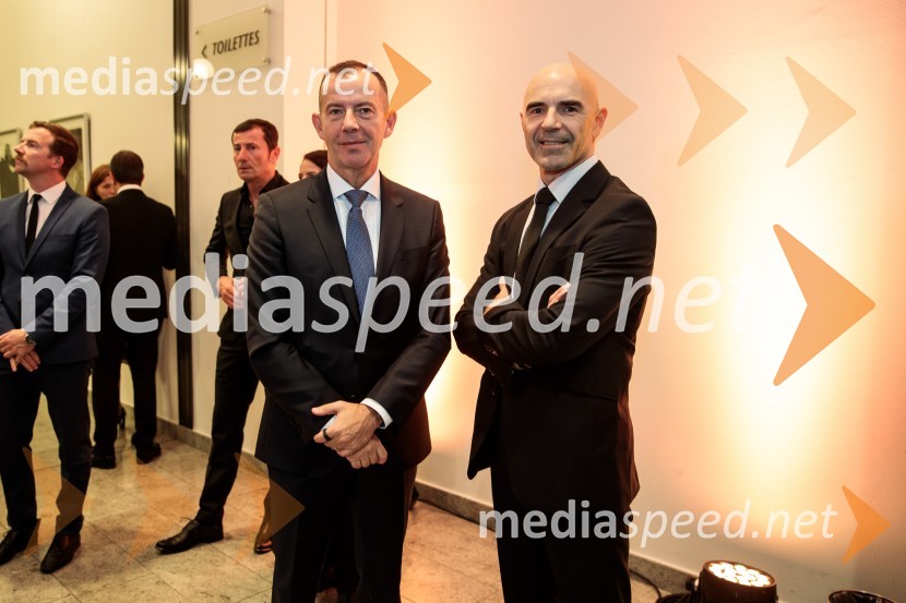  Enzo Smrekar, predsednik uprave Droge Kolinske in glavni direktor strateškega poslovnega področja v Atlantic Grupi, predsednik SZS, podpredsednik Olimpijskega komiteja Slovenije;  Pavel Marđonović, predsednik kolesarske zveze SlovenijaPrimož Roglič predal naziv botra, dobrodelna prireditev Olimpijskega komiteja Slovenije