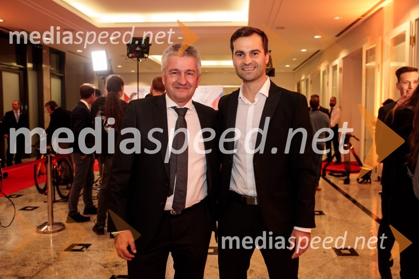 dr. Matjaž Turel, pulmolog;  Robert Hrgota, trener slovenske skakalne reprezentancePrimož Roglič predal naziv botra, dobrodelna prireditev Olimpijskega komiteja Slovenije