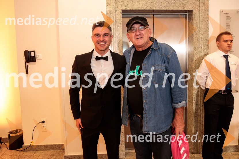  Peter Kauzer, kajakaš na divjih vodah;  ... Primož Roglič predal naziv botra, dobrodelna prireditev Olimpijskega komiteja Slovenije