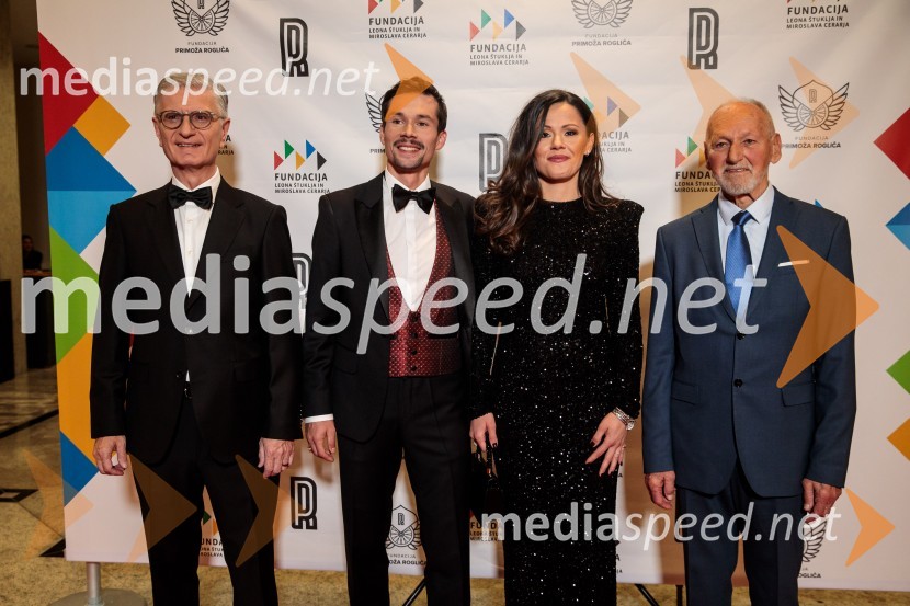  Franjo Bobinac, podpredsednik in generalni direktor za globalni marketing, Hisense International., predsednik Rokometne zveze Slovenije;  Primož Roglič, kolesar;  Lora Roglič Klinc;  Miroslav Cerar, nekdanji gimnastičar, nekdanji predsednik Odbora za podeljevanje Bloudkovih priznanjPrimož Roglič predal naziv botra, dobrodelna prireditev Olimpijskega komiteja Slovenije