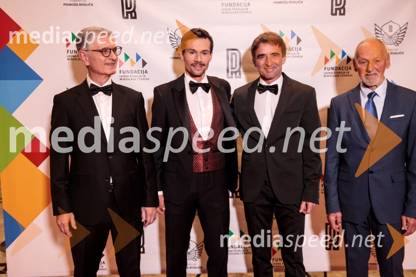  Franjo Bobinac, podpredsednik in generalni direktor za globalni marketing, Hisense International., predsednik Rokometne zveze Slovenije;  Primož Roglič, kolesar;  ... ;  Miroslav Cerar, nekdanji gimnastičar, nekdanji predsednik Odbora za podeljevanje Bloudkovih priznanjPrimož Roglič predal naziv botra, dobrodelna prireditev Olimpijskega komiteja Slovenije