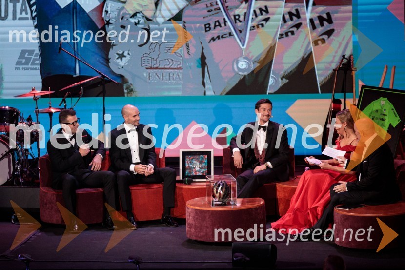  ... ;  Luka Mezgec, kolesar;  Primož Roglič, kolesar;  ... ;  ... Primož Roglič predal naziv botra, dobrodelna prireditev Olimpijskega komiteja Slovenije