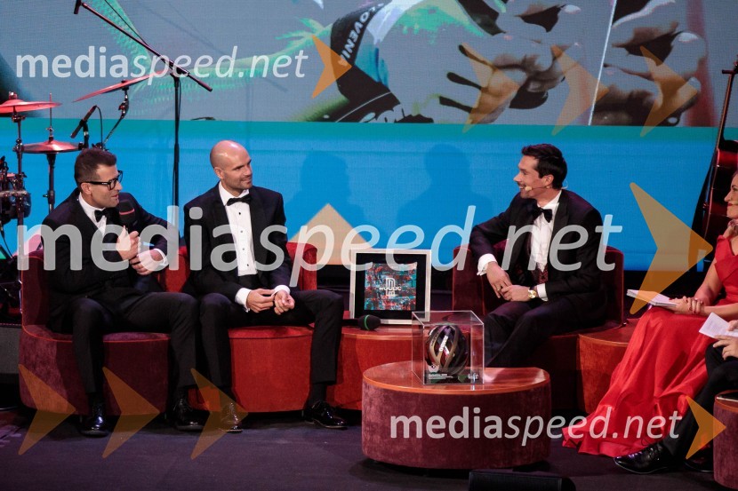  ... ;  Luka Mezgec, kolesar;  Primož Roglič, kolesarPrimož Roglič predal naziv botra, dobrodelna prireditev Olimpijskega komiteja Slovenije