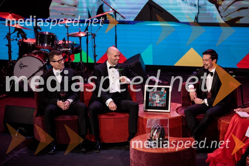  ... ;  Luka Mezgec, kolesar;  Primož Roglič, kolesarPrimož Roglič predal naziv botra, dobrodelna prireditev Olimpijskega komiteja Slovenije