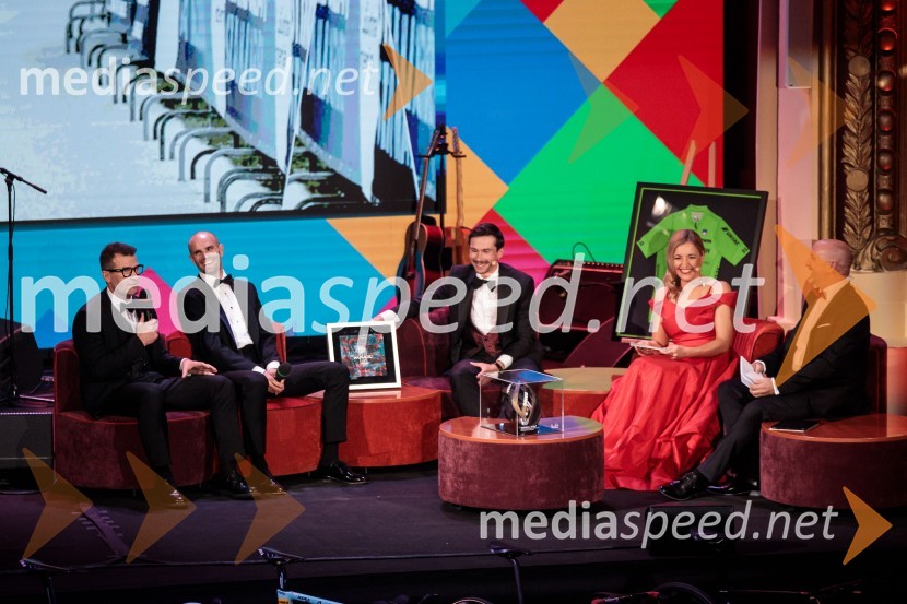  ... ;  Luka Mezgec, kolesar;  Primož Roglič, kolesar;  ... ;  ... Primož Roglič predal naziv botra, dobrodelna prireditev Olimpijskega komiteja Slovenije