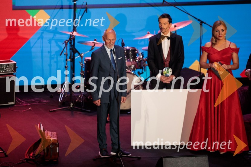  Miroslav Cerar, nekdanji gimnastičar, nekdanji predsednik Odbora za podeljevanje Bloudkovih priznanj;  Primož Roglič, kolesar;  ... Primož Roglič predal naziv botra, dobrodelna prireditev Olimpijskega komiteja Slovenije