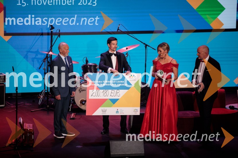  Miroslav Cerar, nekdanji gimnastičar, nekdanji predsednik Odbora za podeljevanje Bloudkovih priznanj;  Primož Roglič, kolesar;  ... ;  ... Primož Roglič predal naziv botra, dobrodelna prireditev Olimpijskega komiteja Slovenije