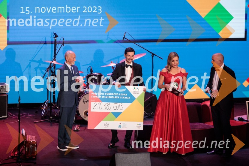  Miroslav Cerar, nekdanji gimnastičar, nekdanji predsednik Odbora za podeljevanje Bloudkovih priznanj;  Primož Roglič, kolesar;  ... ;  ... Primož Roglič predal naziv botra, dobrodelna prireditev Olimpijskega komiteja Slovenije