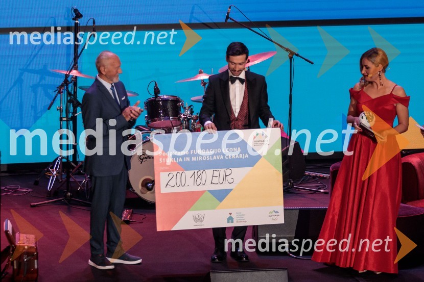  Miroslav Cerar, nekdanji gimnastičar, nekdanji predsednik Odbora za podeljevanje Bloudkovih priznanj;  Primož Roglič, kolesar;  ... Primož Roglič predal naziv botra, dobrodelna prireditev Olimpijskega komiteja Slovenije