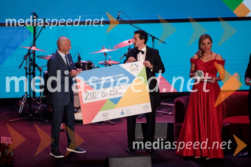  Miroslav Cerar, nekdanji gimnastičar, nekdanji predsednik Odbora za podeljevanje Bloudkovih priznanj;  Primož Roglič, kolesar;  ... Primož Roglič predal naziv botra, dobrodelna prireditev Olimpijskega komiteja Slovenije