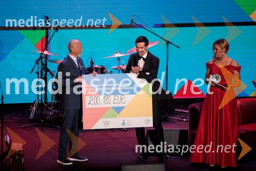  Miroslav Cerar, nekdanji gimnastičar, nekdanji predsednik Odbora za podeljevanje Bloudkovih priznanj;  Primož Roglič, kolesar;  ... Primož Roglič predal naziv botra, dobrodelna prireditev Olimpijskega komiteja Slovenije