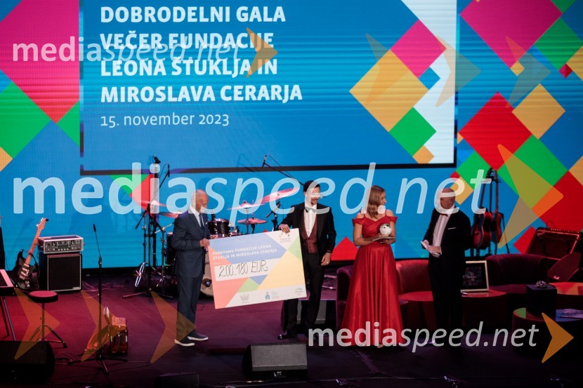  Miroslav Cerar, nekdanji gimnastičar, nekdanji predsednik Odbora za podeljevanje Bloudkovih priznanj;  Primož Roglič, kolesar;  ... ;  ... Primož Roglič predal naziv botra, dobrodelna prireditev Olimpijskega komiteja Slovenije