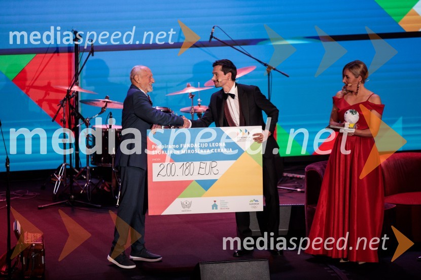  Miroslav Cerar, nekdanji gimnastičar, nekdanji predsednik Odbora za podeljevanje Bloudkovih priznanj;  Primož Roglič, kolesar;  ... Primož Roglič predal naziv botra, dobrodelna prireditev Olimpijskega komiteja Slovenije