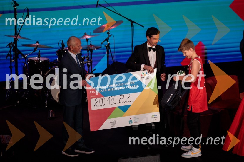  Miroslav Cerar, nekdanji gimnastičar, nekdanji predsednik Odbora za podeljevanje Bloudkovih priznanj;  Primož Roglič, kolesar;  ... Primož Roglič predal naziv botra, dobrodelna prireditev Olimpijskega komiteja Slovenije