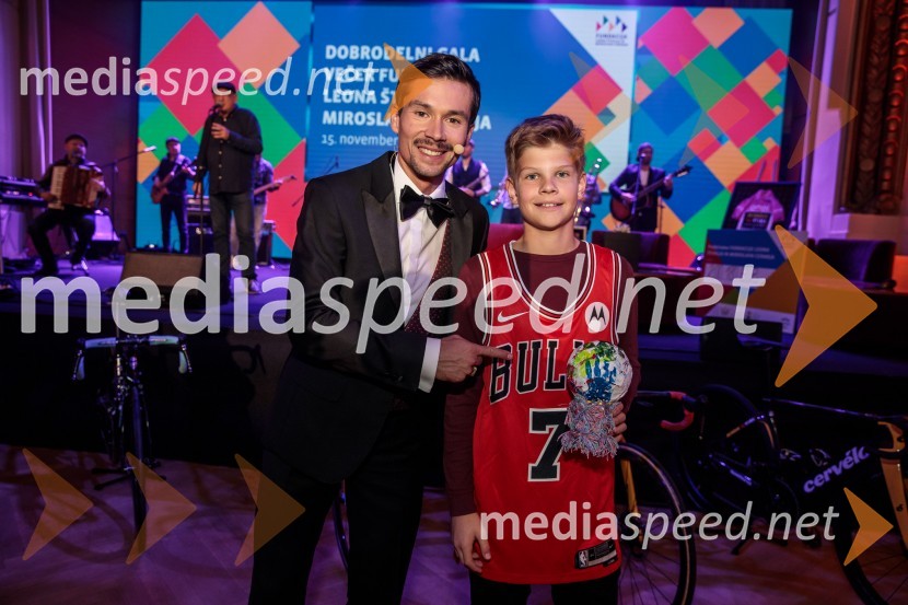  Primož Roglič, kolesar;  ... Primož Roglič predal naziv botra, dobrodelna prireditev Olimpijskega komiteja Slovenije