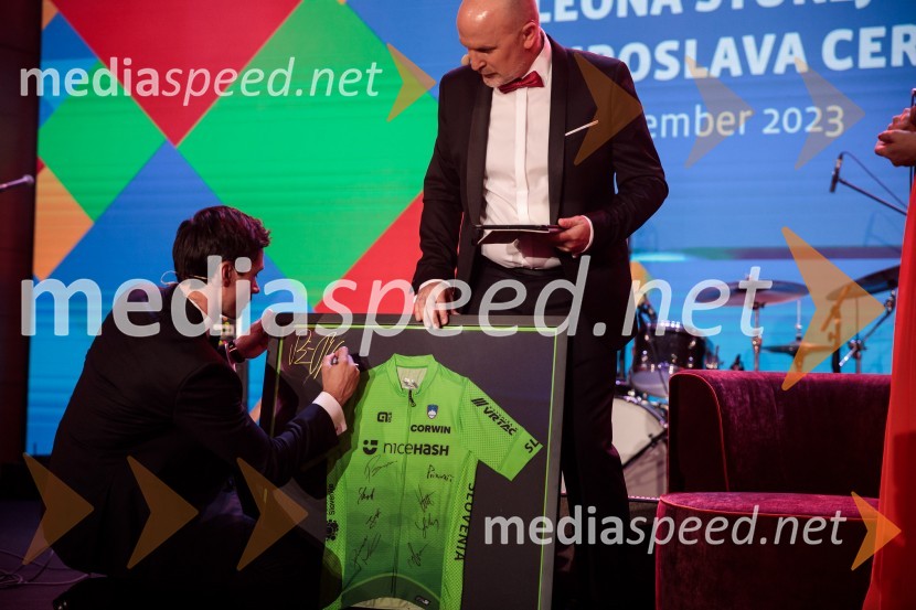  Primož Roglič, kolesar;  ... Primož Roglič predal naziv botra, dobrodelna prireditev Olimpijskega komiteja Slovenije