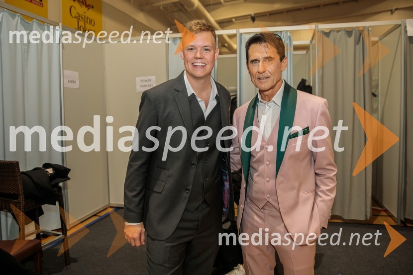  Justus Reid, influenser iz Amerike;  Stojan  Auer, mestni svetnik, LPR - Lista za pravičnost in razvojPoglej in zadeni, 30 let kasneje