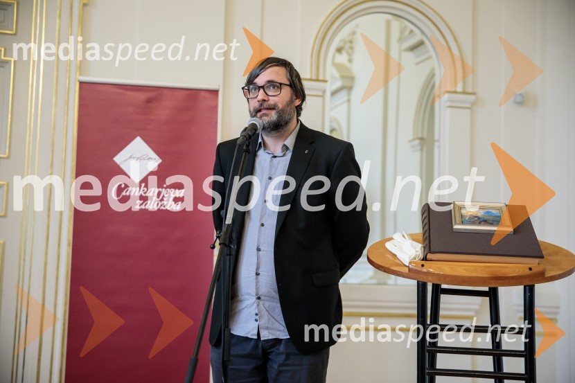  Aljoša Harlamov, urednik Cankarjeve založbePredstavitev monografije Mojstri slovenskega impresionizma