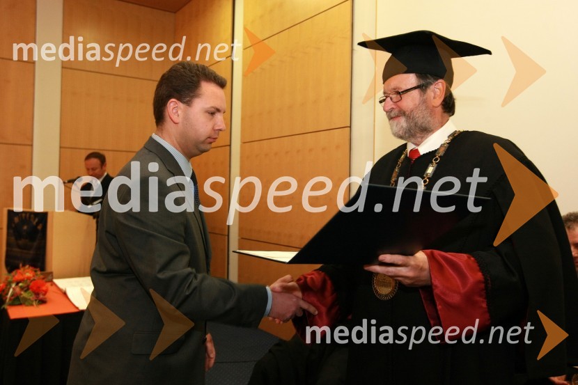 Dr. Andrej Bregar, Fakulteta za elektrotehniko, računalništvo in informatiko Univerze v Mariboru ter prof. dr. Ivan Rozman, rektor Univerze v MariboruUniverza v Mariboru: Promocija doktorjev znanosti, april 2009