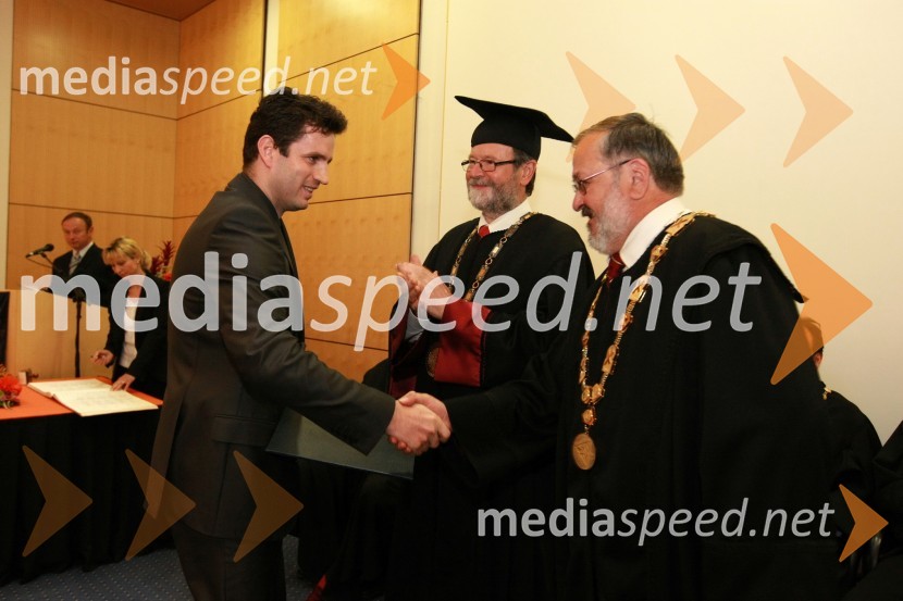 Dr. Zdenko Mezgec, Fakulteta za elektrotehniko, računalništvo in informatiko Univerze v Mariboru, prof. dr. Ivan Rozman, rektor Univerze v Mariboru ter prof. dr. Igor Tičar, dekan Fakultete za elektrotehniko, računalništvo in informatiko Univerze v MariboruUniverza v Mariboru: Promocija doktorjev znanosti, april 2009