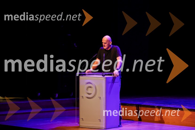 dr. Peter  Klepec, filozof, raziskovalec na Filozofskem inštitutu ZRCSivo na sivem: predavanje dr. Slavoja Žižka in dr. Jureta Simonitija, Cankarjev dom