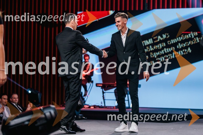  Enzo Smrekar, predsednik uprave Droge Kolinske in glavni direktor strateškega poslovnega področja v Atlantic Grupi, predsednik SZS, podpredsednik Olimpijskega komiteja Slovenije;  Timi Zajc, smučarski skakalecVečer šampionov 2024