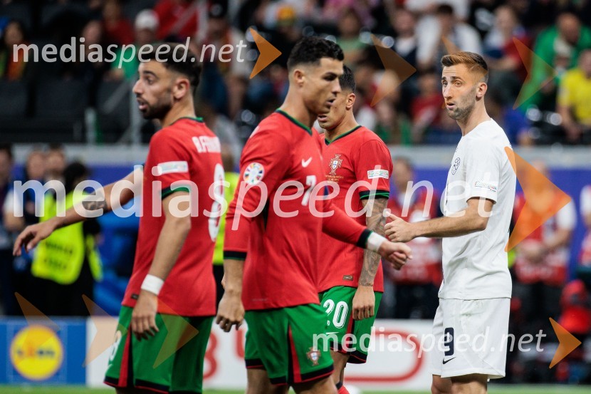  Cristiano Ronaldo, nogometaš, Portugalska;  Andraž Šporar, nogometašKljub porazu je Slovenija dokazala, da zmore