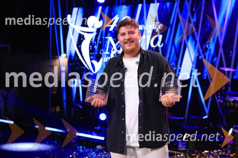  Žan  Videc, glasbenikZmagovalec 43. festivala Melodij morja in sonca je Žan Videc