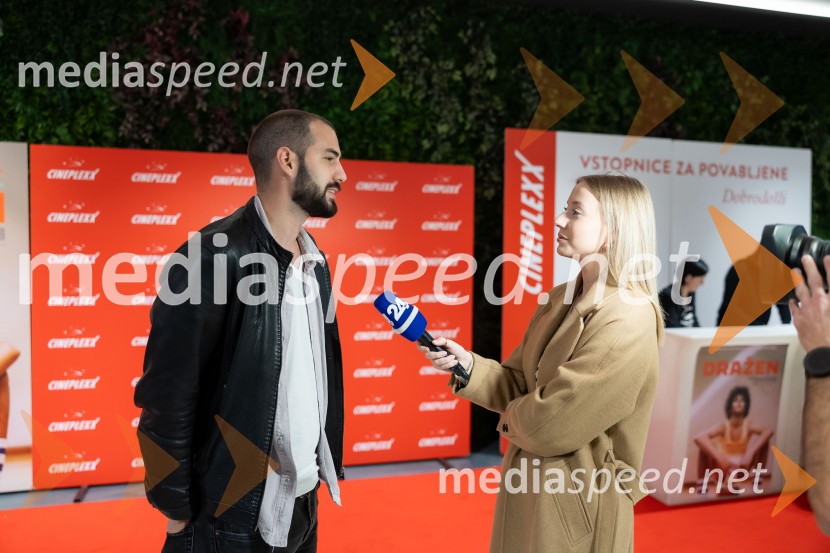  Domagoj Nižić, igralec;  Tjaša Železen, novinarka POP TVPremiera filma o Draženu Petroviću v Cineplexx Ljubljana