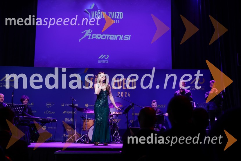  Flora Ema Lotrič, pevkaVečer zvezd: Kolesar leta 2024 je Tadej Pogačar