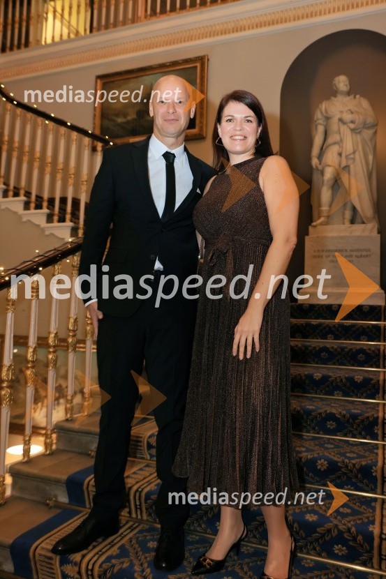  Primož Kozina, odvetnik;  Maruša Uranjek, direktorica, Trimo Group Združeno KraljestvoChristmas Gala 2024, dogodek Britansko - slovenske gospodarske zbornice